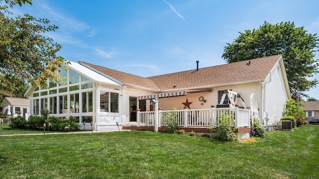 405 Meadowland Dr, Newark, OH 43055 - back of house featuring a sunroom, a yard, and roof with shingles