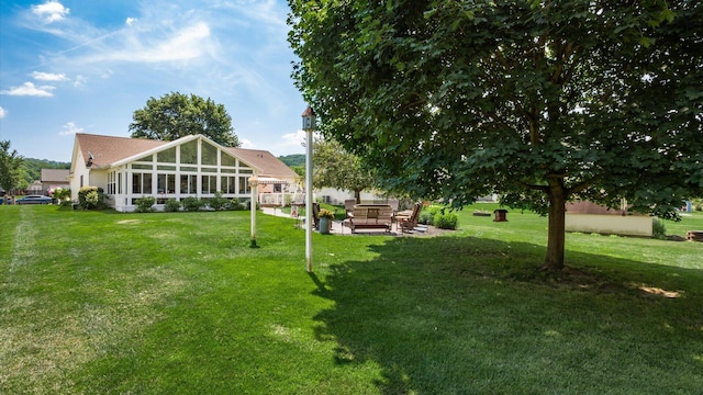 405 Meadowland Dr, Newark, OH 43055 - view of green lawn featuring outdoor lounge area, a sunroom, and a patio area