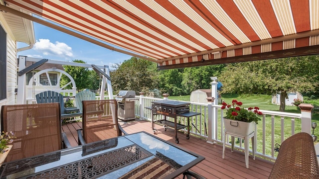405 Meadowland Dr, Newark, OH 43055 - wooden deck with a shed, a yard, outdoor dining area, and grilling area