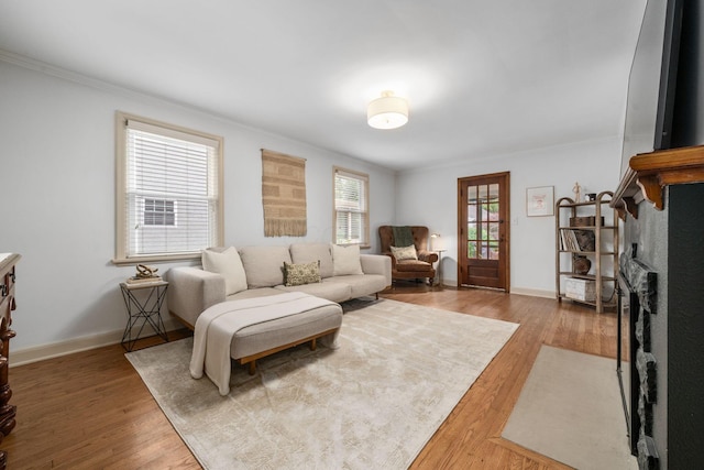 67 Aldrich Rd, Columbus, OH 43214 - living room featuring ornamental molding and wood finished floors