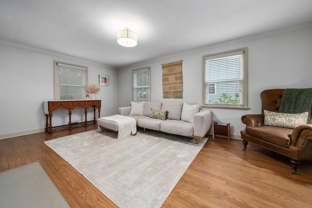 67 Aldrich Rd, Columbus, OH 43214 - living room featuring crown molding and light wood-type flooring