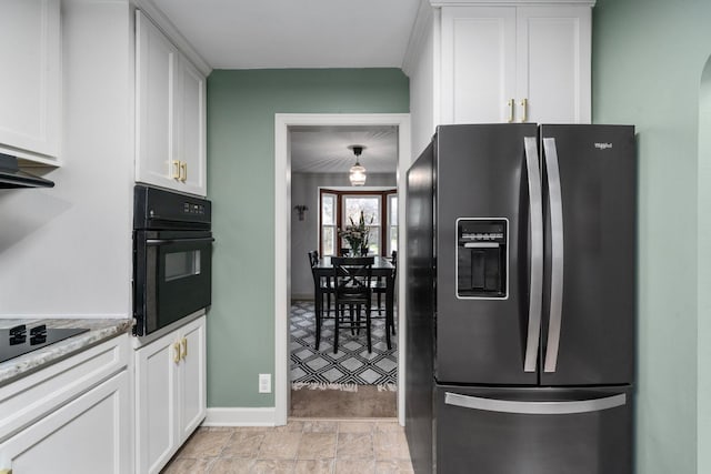67 Aldrich Rd, Columbus, OH 43214 - kitchen with black appliances and white cabinets