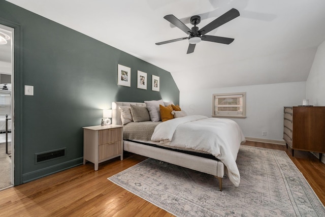 67 Aldrich Rd, Columbus, OH 43214 - bedroom with light wood-style flooring, vaulted ceiling, and ceiling fan