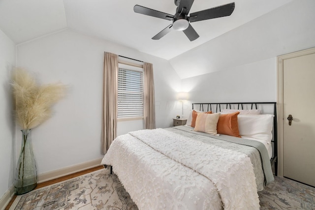 67 Aldrich Rd, Columbus, OH 43214 - bedroom with vaulted ceiling, wood finished floors, and ceiling fan