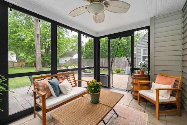 67 Aldrich Rd, Columbus, OH 43214 - sunroom featuring a ceiling fan and an outdoor fire pit