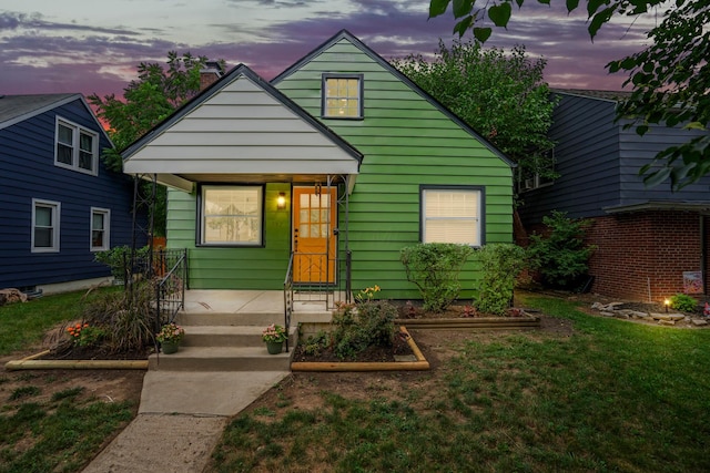 287 S Roys Ave, Columbus, OH 43204 - bungalow-style house with a chimney and a yard