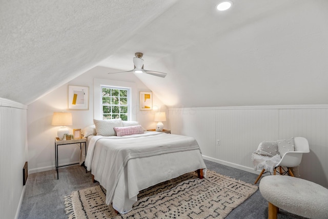 287 S Roys Ave, Columbus, OH 43204 - bedroom with a ceiling fan, lofted ceiling, carpet floors, and a textured ceiling