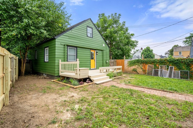 287 S Roys Ave, Columbus, OH 43204 - rear view of property featuring a fenced backyard and a deck