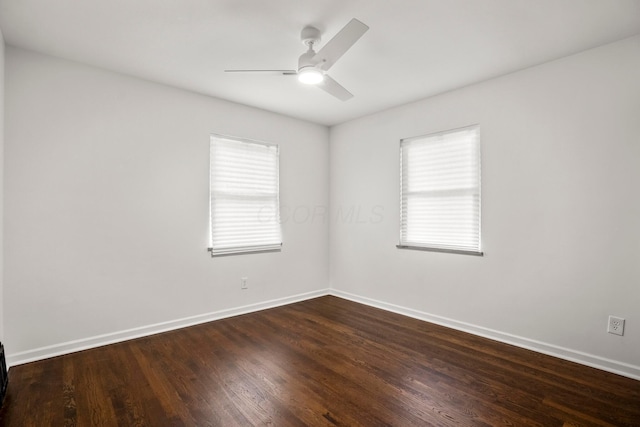 287 S Roys Ave, Columbus, OH 43204 - empty room featuring a ceiling fan and dark wood-style flooring
