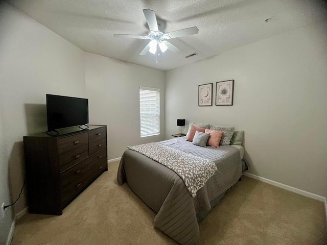 6090 Sowerby Ln, Westerville, OH 43081 - bedroom with light carpet, a ceiling fan, and a textured ceiling