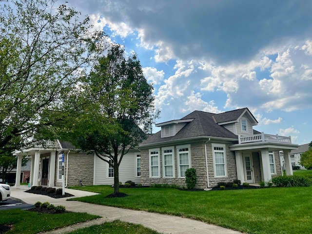 6090 Sowerby Ln, Westerville, OH 43081 - view of front of home with stone siding, a front lawn, and roof with shingles