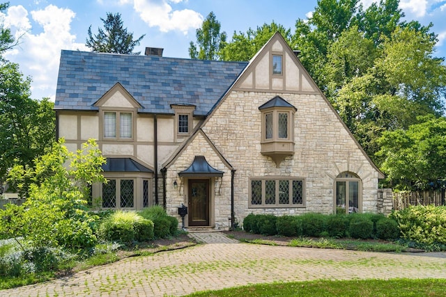 233 S Dawson Ave, Columbus, OH 43209 - tudor home with stucco siding, stone siding, and a high end roof