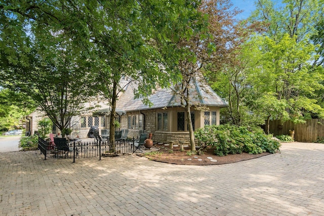 233 S Dawson Ave, Columbus, OH 43209 - view of front of house with stone siding and a patio area