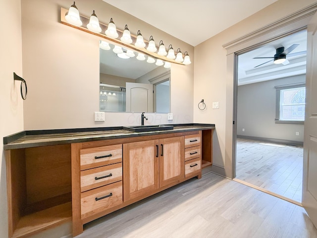 69 N Cherry St, Mount Gilead, OH 43338 - full bathroom with vanity, wood finished floors, and a ceiling fan
