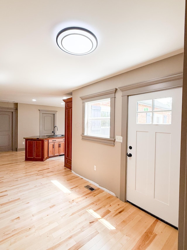 69 N Cherry St, Mount Gilead, OH 43338 - foyer entrance featuring plenty of natural light, light wood-style floors, and recessed lighting