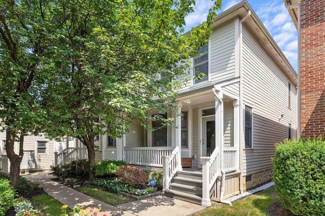 979 Delaware Ave, Columbus, OH 43201 - view of front facade featuring covered porch
