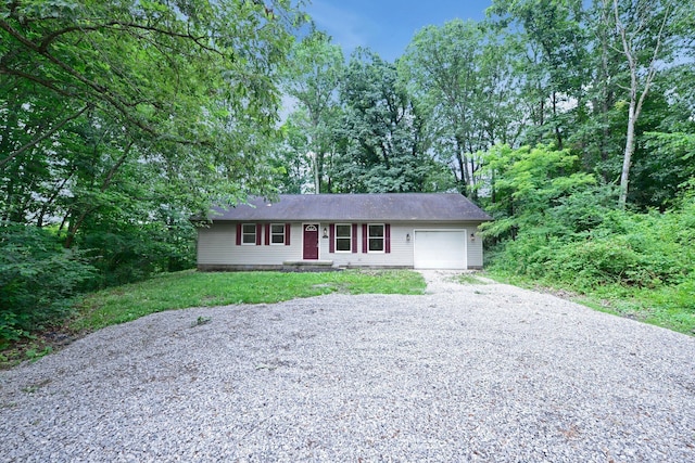 1142 Rozelle Creek Rd, Chillicothe, OH 45601 - ranch-style home featuring a garage and driveway
