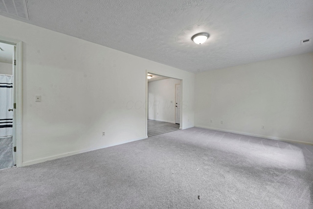 1142 Rozelle Creek Rd, Chillicothe, OH 45601 - unfurnished room featuring carpet flooring and a textured ceiling