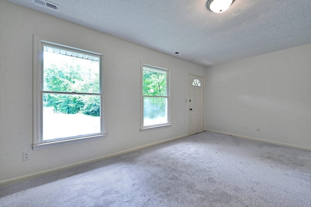 1142 Rozelle Creek Rd, Chillicothe, OH 45601 - carpeted empty room with a textured ceiling