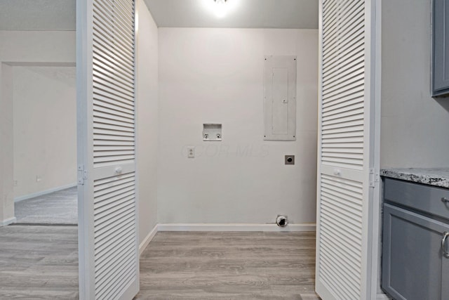 1142 Rozelle Creek Rd, Chillicothe, OH 45601 - laundry room featuring hookup for an electric dryer, electric panel, hookup for a washing machine, and light wood-style flooring