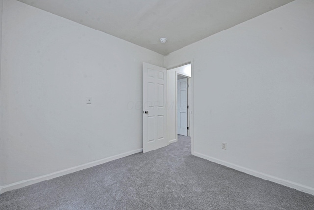 1142 Rozelle Creek Rd, Chillicothe, OH 45601 - unfurnished room featuring carpet floors and a smoke detector