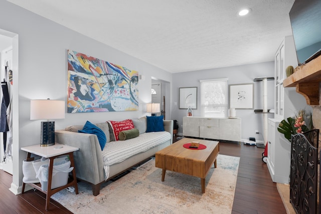 3823 Ramblehurst Rd, Columbus, OH 43221 - living room with hardwood / wood-style flooring, recessed lighting, and a textured ceiling