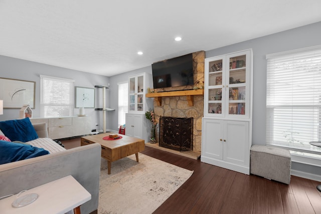 3823 Ramblehurst Rd, Columbus, OH 43221 - living room featuring dark wood-style floors, a fireplace, and recessed lighting