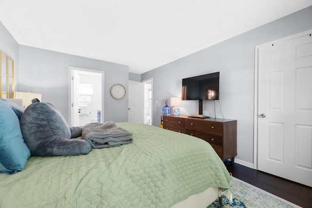 3823 Ramblehurst Rd, Columbus, OH 43221 - bedroom with dark wood-style floors and ensuite bathroom