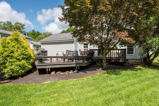 3823 Ramblehurst Rd, Columbus, OH 43221 - back of property with a deck, a yard, and roof with shingles