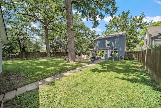 1467 Melrose Ave, Columbus, OH 43224 - fenced backyard with a patio area
