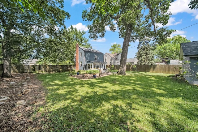 1467 Melrose Ave, Columbus, OH 43224 - fenced backyard with a patio area