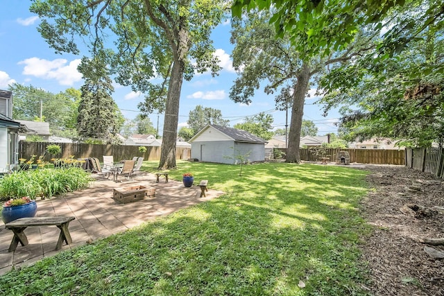 1467 Melrose Ave, Columbus, OH 43224 - fenced backyard featuring a patio and an outdoor fire pit