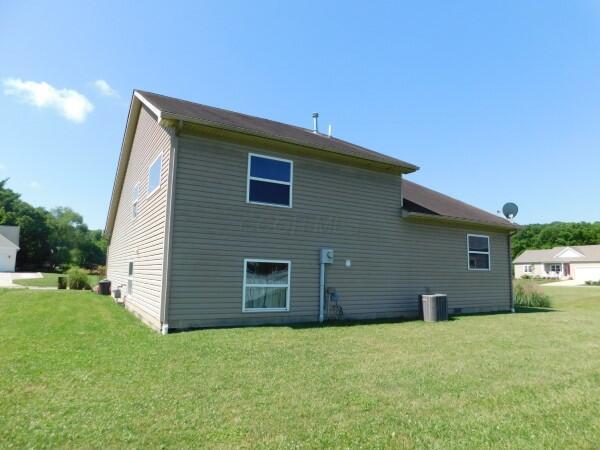 32340 Lilac Ln, Logan, OH 43138 - back of house with a yard