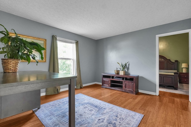 5683 Levi Kramer Blvd, Canal Winchester, OH 43110 - office area featuring wood finished floors and a textured ceiling