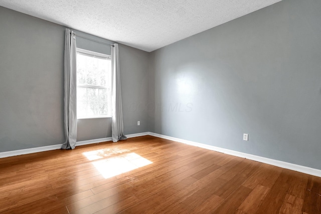 5683 Levi Kramer Blvd, Canal Winchester, OH 43110 - spare room featuring a textured ceiling and wood finished floors