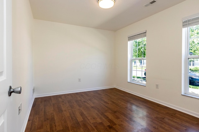 7145 Billy Goat Dr, New Albany, OH 43054 - unfurnished room featuring dark wood-style flooring and healthy amount of natural light