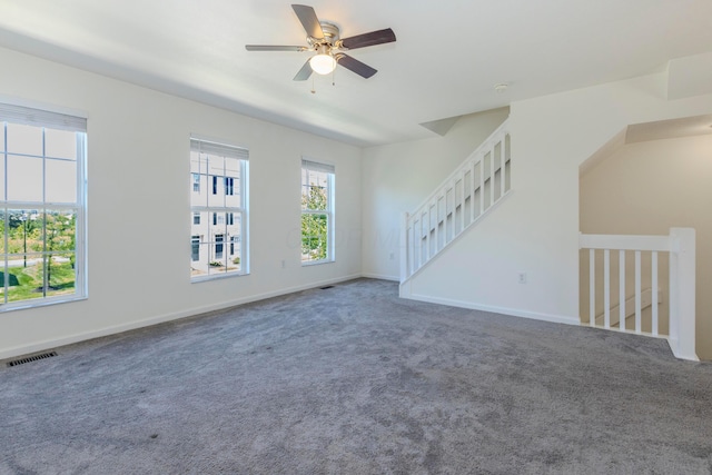 7145 Billy Goat Dr, New Albany, OH 43054 - unfurnished living room with ceiling fan and carpet