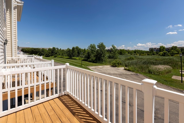 7145 Billy Goat Dr, New Albany, OH 43054 - wooden deck with view of wooded area