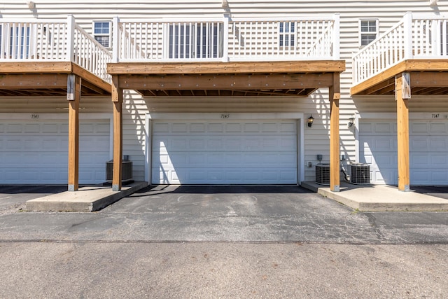 7145 Billy Goat Dr, New Albany, OH 43054 - garage with asphalt driveway