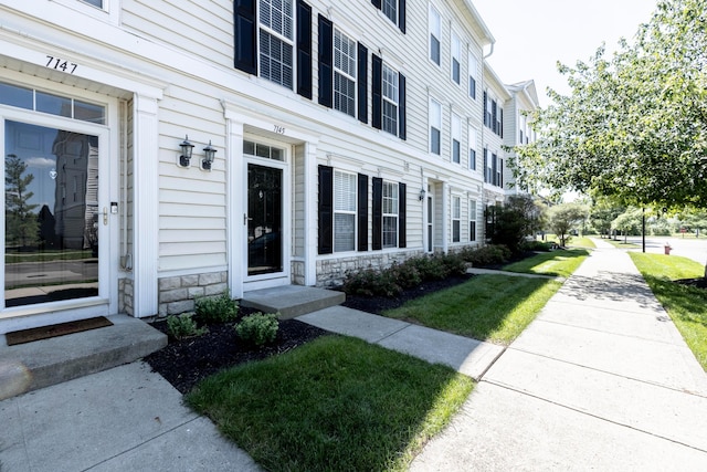 7145 Billy Goat Dr, New Albany, OH 43054 - entrance to property with stone siding