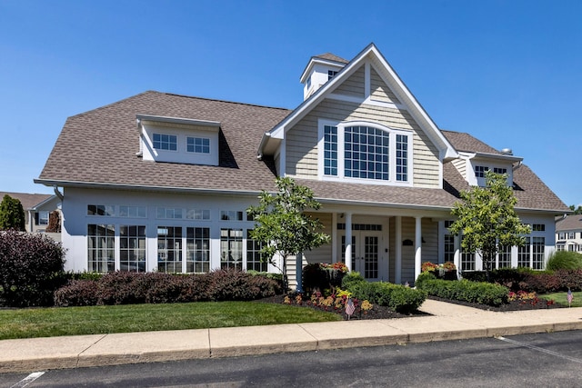 7145 Billy Goat Dr, New Albany, OH 43054 - view of front facade with roof with shingles and a porch