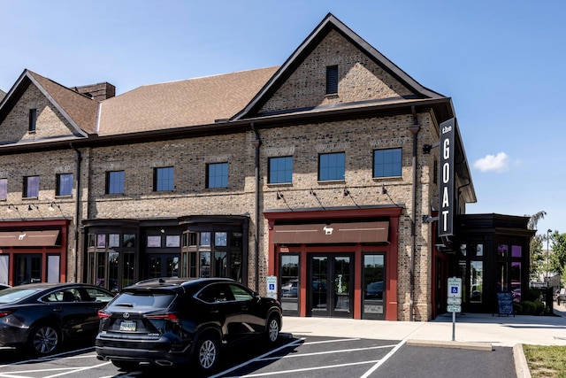 7145 Billy Goat Dr, New Albany, OH 43054 - view of building exterior featuring uncovered parking