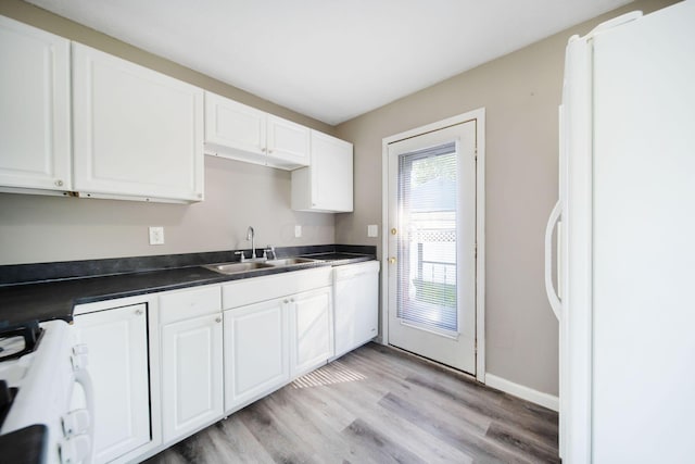 2272 Eden Ave, Columbus, OH 43224 - kitchen featuring white appliances, white cabinetry, light wood-style flooring, and dark countertops