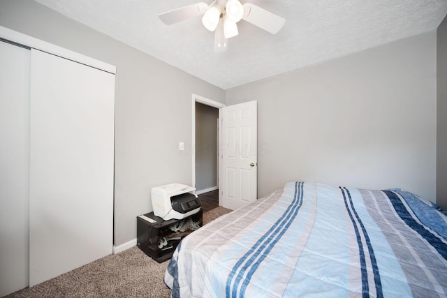 2272 Eden Ave, Columbus, OH 43224 - carpeted bedroom with a ceiling fan, a closet, and a textured ceiling