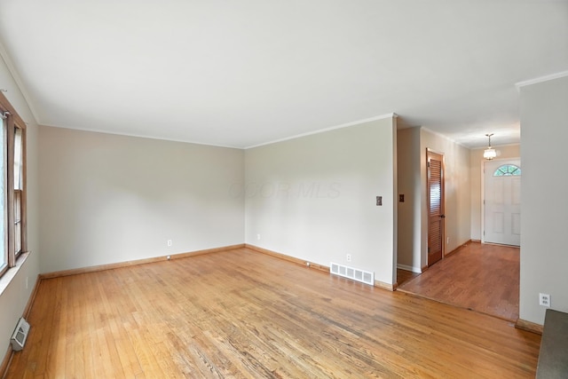 899 Meadowview Dr, Columbus, OH 43224 - unfurnished room featuring light wood finished floors and crown molding