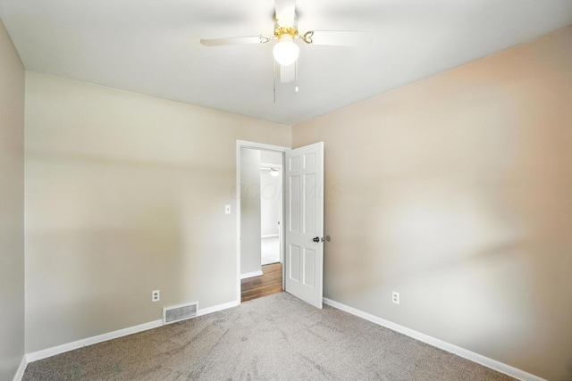 899 Meadowview Dr, Columbus, OH 43224 - carpeted empty room with baseboards and a ceiling fan