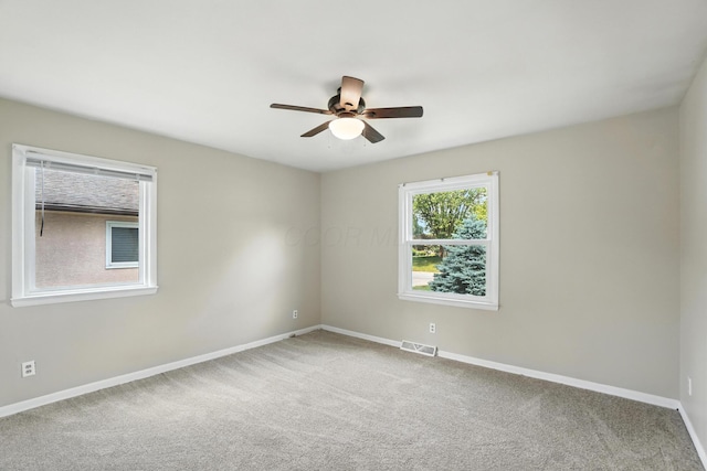 899 Meadowview Dr, Columbus, OH 43224 - empty room featuring a ceiling fan and carpet floors