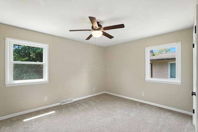 899 Meadowview Dr, Columbus, OH 43224 - carpeted empty room with baseboards and ceiling fan