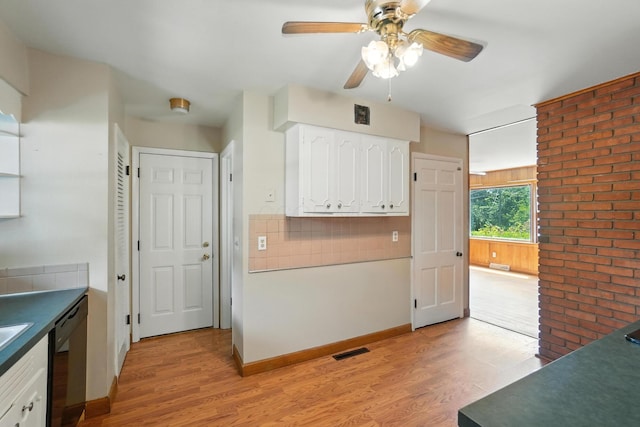 899 Meadowview Dr, Columbus, OH 43224 - kitchen featuring a ceiling fan, light wood-style flooring, white cabinetry, dishwasher, and tasteful backsplash