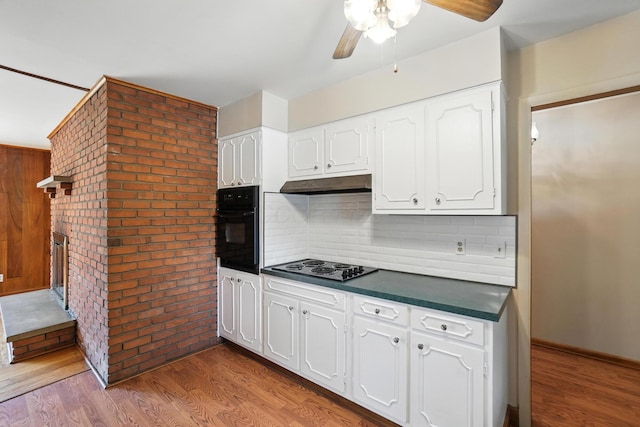 899 Meadowview Dr, Columbus, OH 43224 - kitchen with black appliances, dark countertops, white cabinets, a ceiling fan, and light wood-type flooring